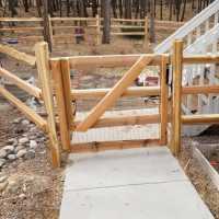swing swing gate constructed of split rail fencing