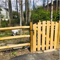 picket fence gate installed in split rail fence near columbus ohio