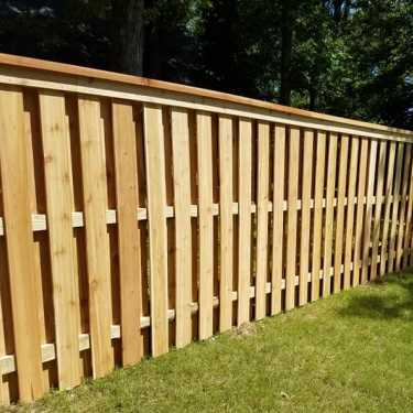 wood shadow box fence installed by our contractors in Columbus