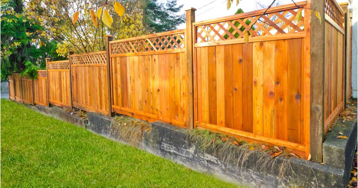 wood privacy fence with lattice top